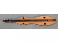 A black walnut and spruce Mountain Dulcimer made by John C. Knopf of Westland