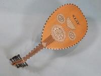 A Egyptian Oud decorated in mother of pearl and brass in the Moorish manner