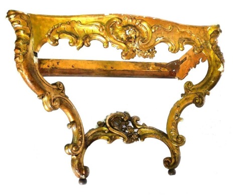 A late 18th/early 19thC giltwood console table, with a serpentine fronted variegated white marble top, the base carved with rococo scrolls, flowers, etc., on cabriole legs with shaped stretcher, 83cm high, 116cm wide, 58cm deep.