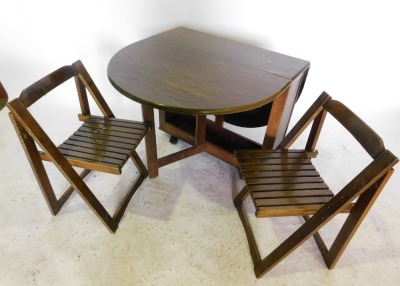 An oak drop leaf trolley table, with oval top, on plain supports, with castors, housing two folding slatted chairs, 86cm wide. - 2