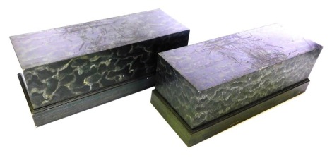 A pair of rectangular plinths, each painted to simulate marble, 47cm high, 128cm wide, 50cm deep.