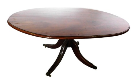 A 19thC mahogany breakfast table, the oval top with a moulded edge, on turned column and reeded splayed legs, with brass castors, 68cm high, 149cm wide, 102cm deep.