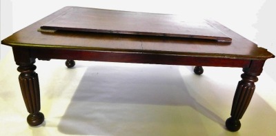 An early Victorian mahogany extending dining table, the rectangular top with moulded edge and rounded corners, on turned fluted legs, one loose leaf, 73cm high, 143cm wide, 263cm long. - 2