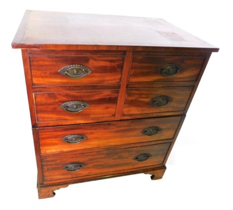 A 19thC mahogany commode chest, the rectangular cross banded top with an ebony and boxwood strung border, above four false drawers hinged to reveal a recess, and two long false drawers hinged to reveal a further recess, on bracket feet, 80cm high, 71cm wi