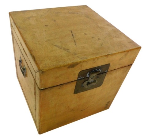 A Chinese pig skin box, with brass lock plate side handles, 40cm wide.