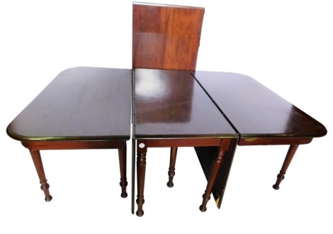 A 19thC mahogany extending dining table, comprising two rectangular D end sections, each with turned legs and a central drop leaf section, 72cm high, 136cm wide, 322cm long.