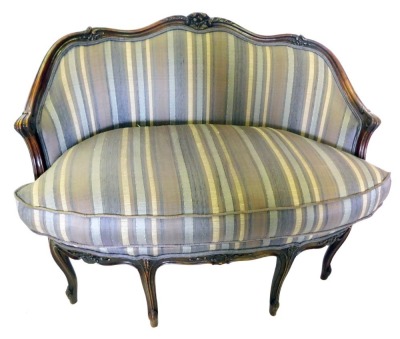 A small late 19th/early 20thC French stained beech show frame sofa, upholstered in striped fabric, on cabriole legs, 114cm wide.