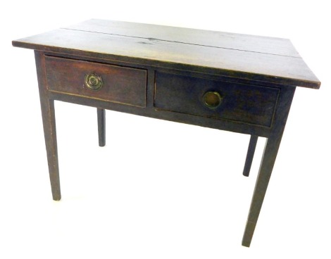 A late 18th/early 20thC oak side table or lowboy, with planked top above two frieze drawers, on square tapering legs, 67cm high, 88cm wide, 53cm deep.