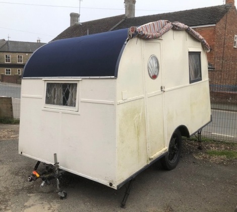 A vintage touring caravan.