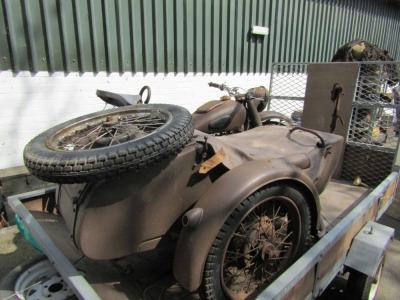 A Russian combination motorcycle and sidecar, with machine gun turret. Please note: The trailer is NOT included with this lot, it is Lot No 5. - 2