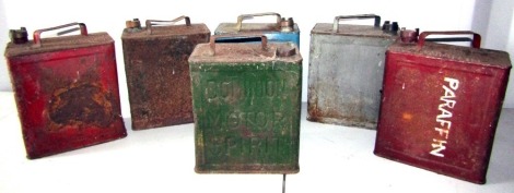 Six petrol cans, two being marked, one for Dominion Motor Spirit, the other for Air Ministry.