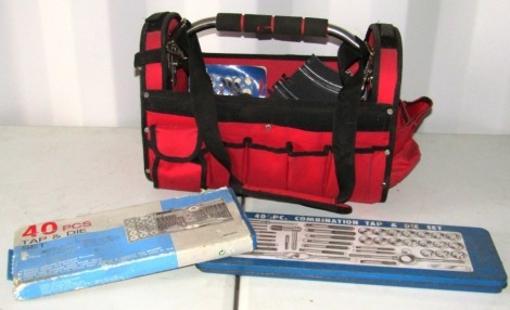 Two tap and die sets and a red tool bag with tools.