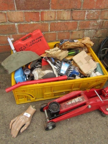 Various hand tools and small trolley jack.