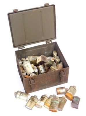 An ammo tin, containing World War II soldier's foot powder.