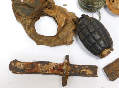 A First World War battlefield relics, to include German Butcher bayonet, and Mills grenade. - 2