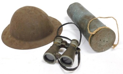 A World War I British Brodie helmet shell, World War I German binoculars, and a shell case. - 2