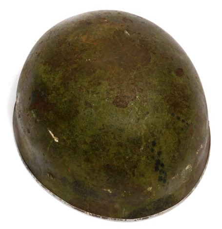 A World War II 1944 dated para helmet.