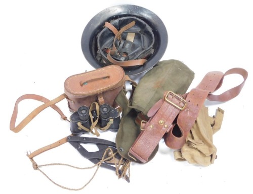 Mixed militaria, to include World War II binoculars, officer's Sam Browne leather belt, helmet, wire cutters, etc.