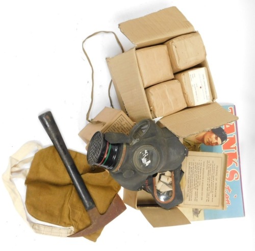 A World War II ARP gas masks, axe, bandages, etc.