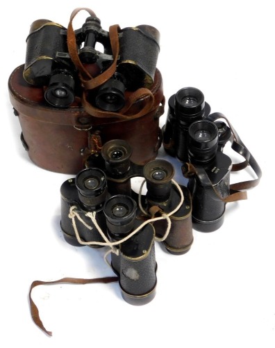 Various binoculars, to include military examples, one being World War I dated.