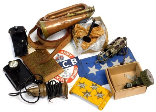 Various items of militaria, to include inspection lamps, bugle, military vehicles parts, etc.