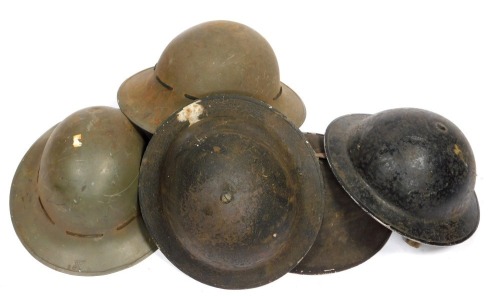 Various military tin helmets.