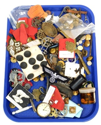 Various military badges and buttons, to include officer's pips, RAF buttons, Lincolnshire Police badge, various cap badges, etc.