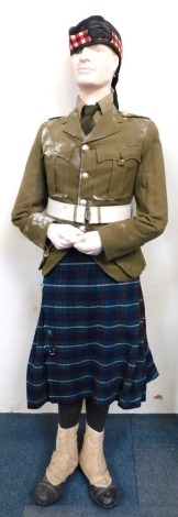 A mannequin wearing Scottish military uniform.