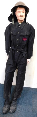 A mannequin wearing ARP style boiler suit.