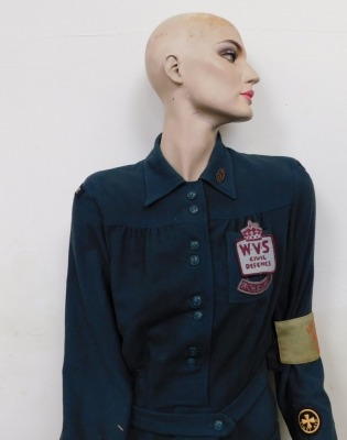 A female mannequin wearing WVS Women's Voluntary Service style dress. - 2