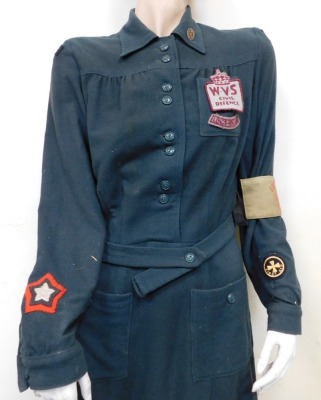 A female mannequin wearing WVS Women's Voluntary Service style dress. - 3