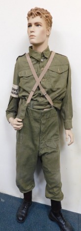 A male mannequin wearing Home Guard style uniform.