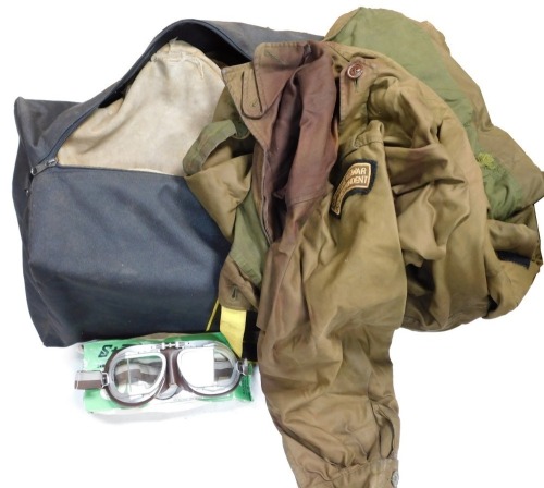 Various reenactment uniforms, kit bag, goggles, etc.
