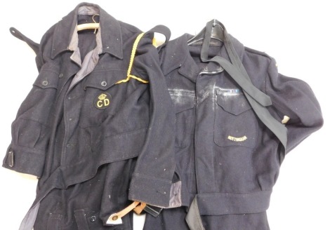 Two post World War II Civil Defence battle dress uniforms.