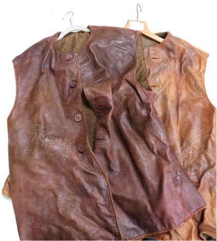 Two military leather jerkins.