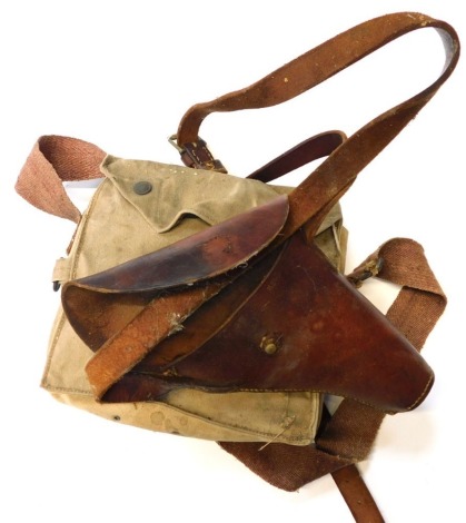 A leather flare pistol holster, and World War I period gas mask bag.