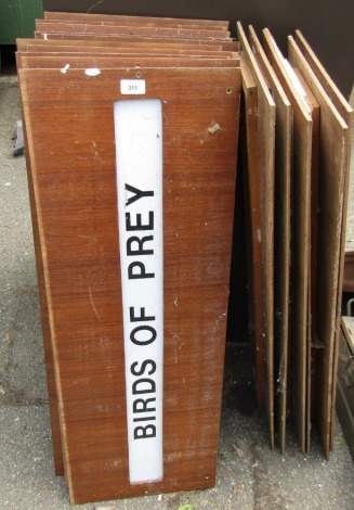 A selection of old museum signs, with regimental names.