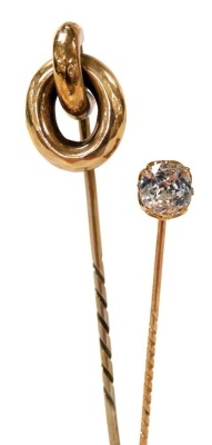 A Victorian paste set tie pin, stamped 15, 1.4g, and a double loop tie pin, yellow metal, 2.5g. (2) - 2