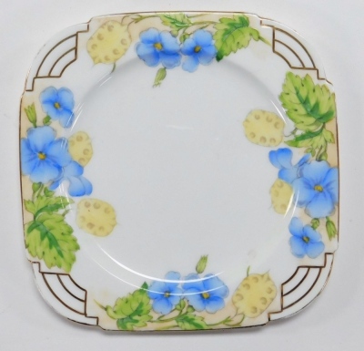 An early 20thC Paragon Honesty pattern porcelain part tea service, Aztec shape, being a replica of a service made for HM The Queen, comprising bread plate, six teacups, saucers and tea plates. - 5