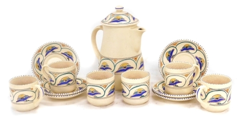 A Honiton pottery part coffee service, comprising coffee pot, six coffee cups and saucers.