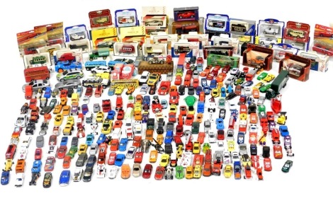 Corgi, Lledo, Oxford and other diecast vintage trucks, trams, cars, etc., some boxed, others unboxed and play worn. (2 boxes)