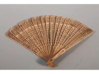 A Victorian pierced bone fan