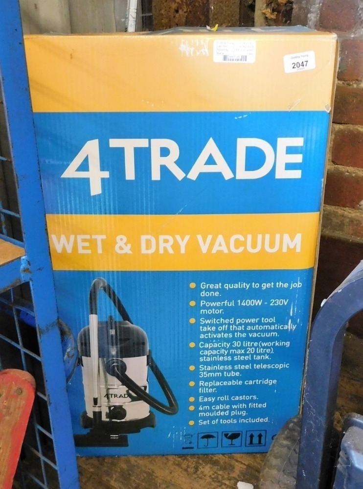 A 4Trade wet and dry vacuum, boxed.