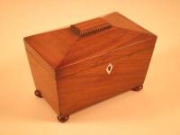 A Victorian mahogany sarcophagus shaped tea chest