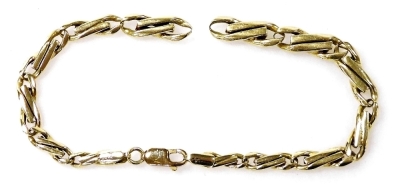 A lady's gold fancy link bracelet, yellow metal, stamped 585, on a lobster claw clasp, stamped 375, 18.4g. (AF)