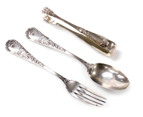 A group of small Continental silver, possibly French, comprising fork and spoon, Alphonse Debain, each handle cast with leaves and foliate decoration, together with a pair of sugar tongs, the handle cast with flowers with lion paw nips, 4.41oz.