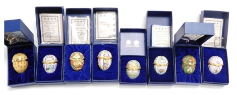 Eight Halcyon Days enamel Easter egg trinket boxes, for 2005, 1991, 1993, 1994, 1996, 1990, 2003, and an undated example, each 6cm high, boxed.