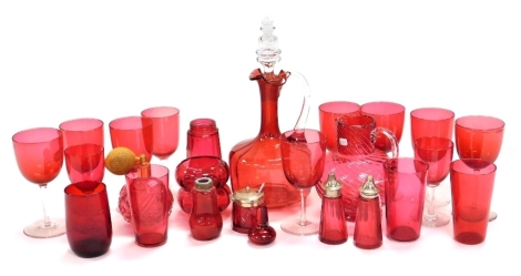 A group of Victorian and later cranberry coloured glass ware, to include drinking glasses, claret jug, 27cm high, atomiser, etc. (1 tray)