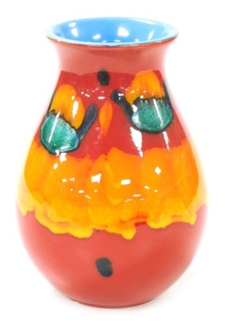 A Poole pottery vase decorated in the Volcano pattern, of baluster form, 21cm high.