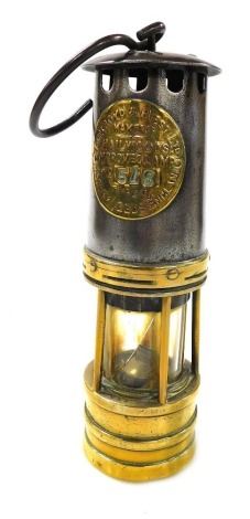 An Ackroyd and Best Limited Hailwoods Improved Miners Lamp, number 518, 28cm high.